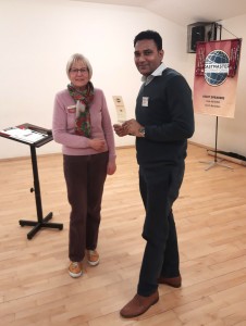 Dev presented with Icebreaker award by Amanda 